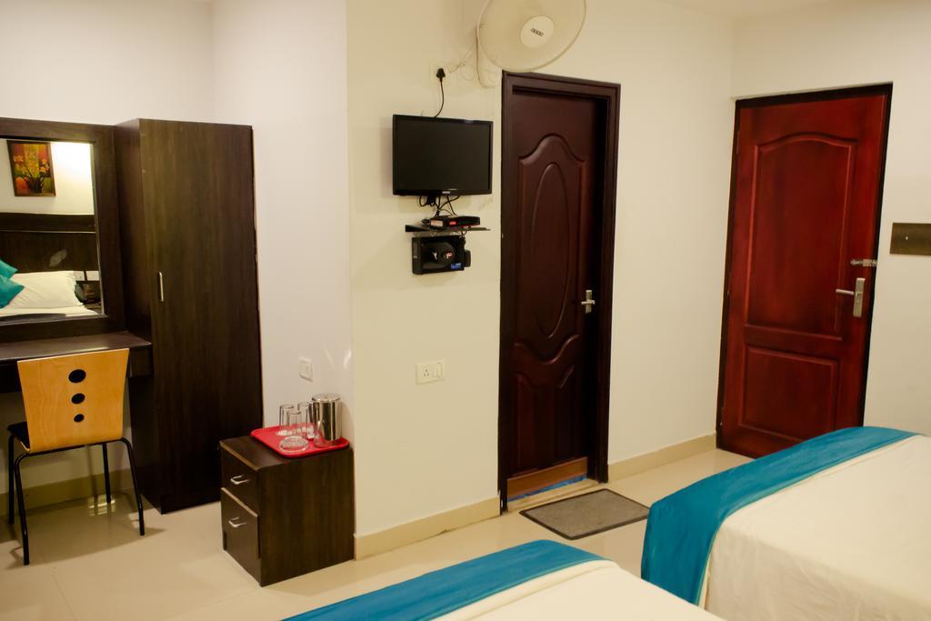The Signature Inn Бангалор Стая снимка