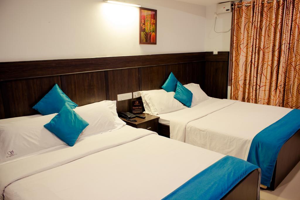 The Signature Inn Бангалор Стая снимка